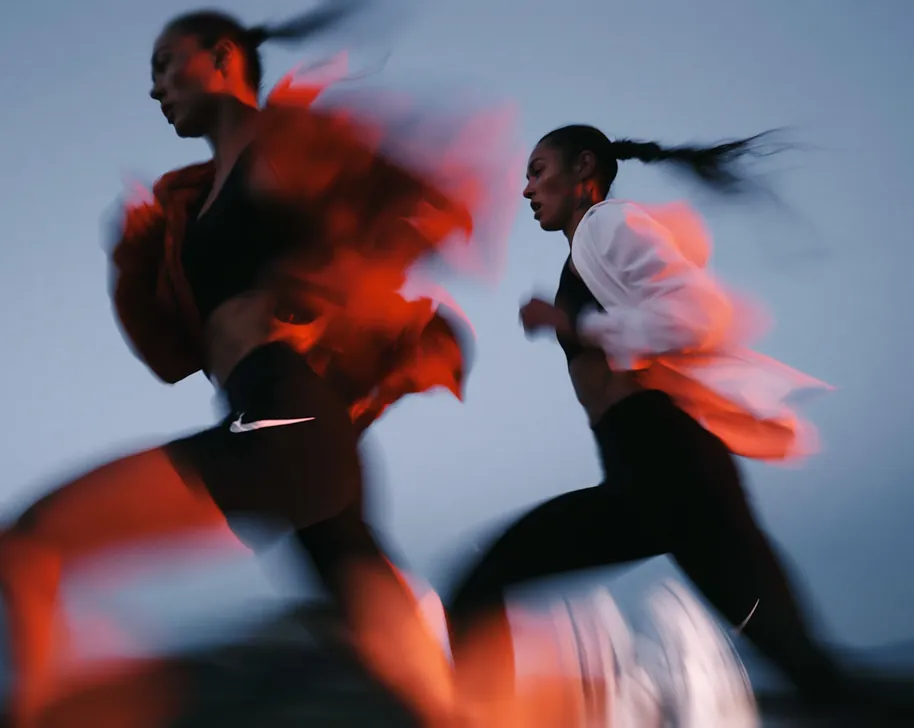 Runners in motion, still readable as they move